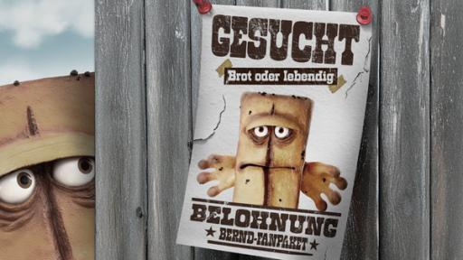 „Gesucht“-Plakat mit Bernd das Brot, der besorgt hinter einem Holzzaun hervorschaut.