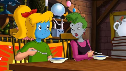 Überraschung für Mania | Rechte: KIDDINX Bibi Blocksberg und Schubia werden beim Essen der Suppe ganz blau im Gesicht.