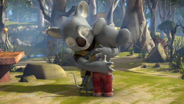 Blinky umarmt seinen Vater, der überraschend von seiner Reise zurückgekehrt ist.<br/>