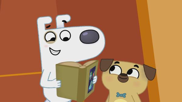 Die zwei mutigen und neugierigen Abenteurer, Dog (links) und Puck (rechts), sozusagen die Phileas Fogg und Passepartout des Buchhandels, tun nichts lieber, als buchstäblich in ein gutes Buch einzutauchen.