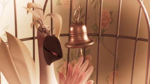 Rechte: KiKA/2022 Sixteen South/Mikros Animation IP/Tencent Ein Kakadu sitzt in einem Vogelkäfig vor einer kleinen Glocke und sieht dabei sehr glücklich aus.