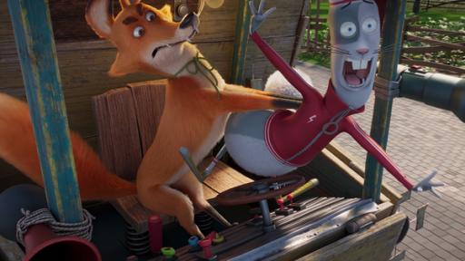 Fuchs Franky und Häsin Maggie kämpfen um das Lenkrad des Hühnerstallgefährts.