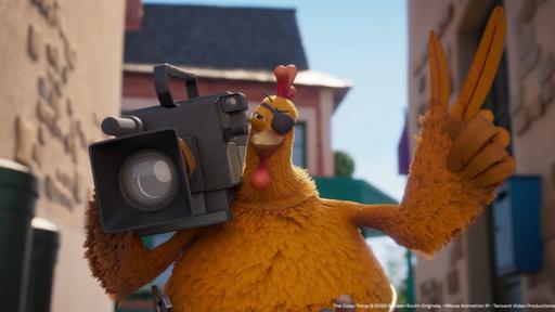 Huhn Flo steht in einer Häuserflucht und hält lässig eine Filmkamera auf der Schulter. Mit dem Flügel macht es eine coole Geste.