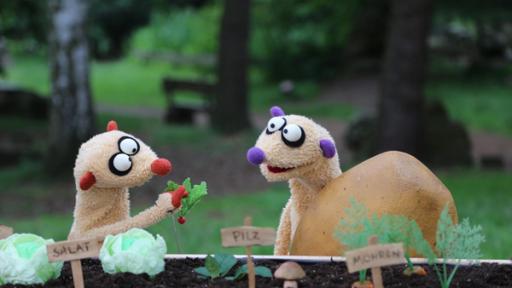 Die Gartenbande | Rechte: bigSmile Entertainment Ein neuer Fall für die Erdmännchen: der Kommissar und seine Schwester suchen die Schlüssel für die Handschellen, mit denen sie aneinandergefesselt sind.