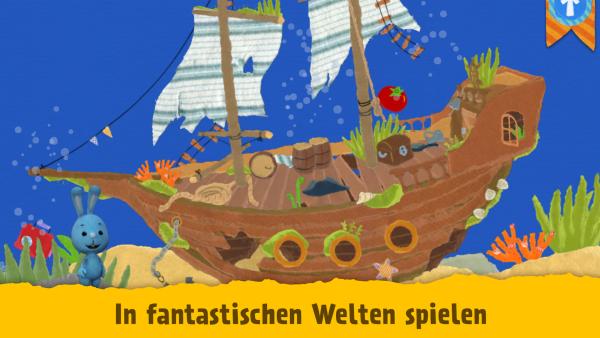 Das Bild zeigt ein versunkenes Schiff im Ozean. Daneben steht das KiKANiNCHEN. Unter dem Bild steht: In versunkenen Welten spielen. 