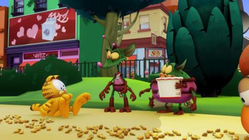 Garfield mit Außerirdischen in einem Park.