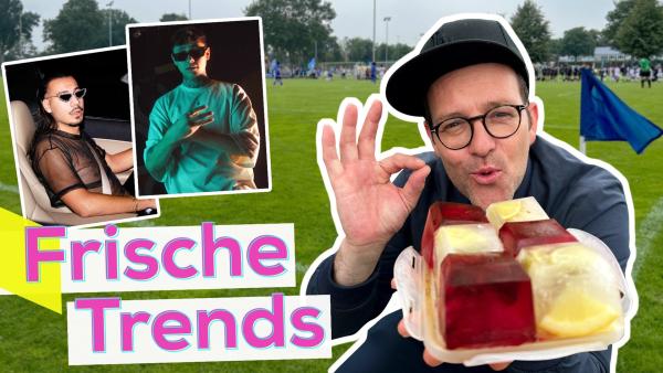 Eine Bildmontage: Hinten ein Fußballfeld. Davor links mit weißer Umrisslinie Ben, halbnah. Auf seiner Hand zeigt er mit zustimmender Geste und fröhlichem Blick sechs große Eiswürfel mit eingefrorenem Obst. Oben links zwei kleine Bilder von Deutschrapper Apache 207 und Rapper Yung Yury. Unten links der Schriftzug "Frische Trends".