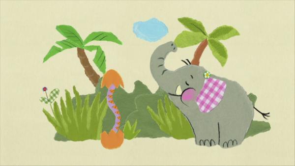 Ein Elefant und eine Schlange stehen sich gegenüber