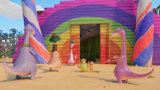 Wir sehen im Hintergrund eine Regenbogenfarbene Bretterwand, in die eine Schiebetüre eingelassen ist. Vor der Türe hat sich eine Dinosaurier-Schlange gebildet. Lucy steht ebenfalls davor, sie hat eine riesige Tee-Kanne neben sich und strahlt Minus Drei an, der vor ihr steht und scheinbar nicht glauben kann, was er da gerade sieht.