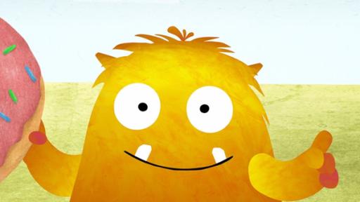 Rechte: KiKA/Filmakademie Baden-Württemberg GmbH/Eagle Eye Ein gelbes Yeti-Kind den Buchstaben D. Das D besteht aus einem halben Donut und einem senkrecht ausgestreckten Dackel, der die beiden Donut-Enden verbindet.