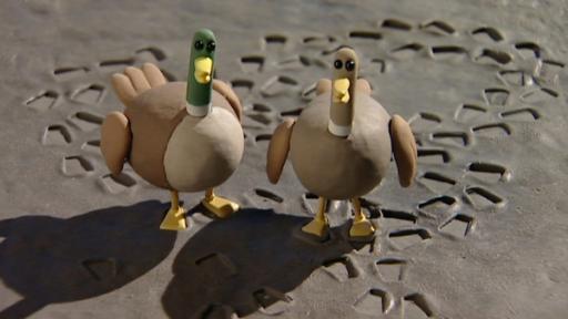 Zwei Enten auf Beton