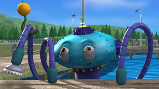 Rechte: KiKA/Mike Young Productions Roboter UMA schaut mit erhobenen Greifarmen hinter dem Bootssteg aus dem Wasser heraus. Ein Arm wird von einem Kranhaken gehalten.
